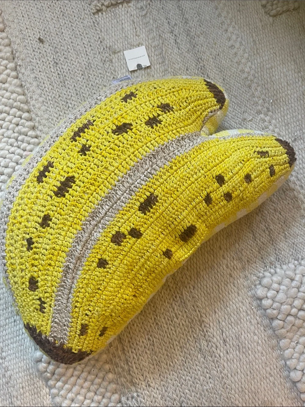 Woven Banana Pillow from Anthropologie.